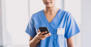 Nurse holding phone secret recordings